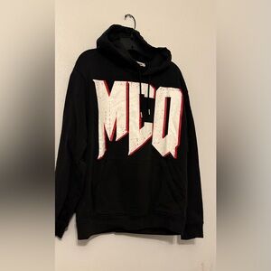 Alexander McQueen Black Hoodie with Bold White and Red Logo